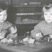 Educating children to be independent through self-directed activity is one of the most important goals of Montessori education. Here two children are cleaning instruments. They have put on sleeve protectors, fetched the cleaning materials and remembered to cover the table to protect it. Montessori nursery, Berlin-Tem-pelhof, 1955 -T. Müller, R. Schneider, <em>Lehrmaterialien 1913-1935. Möbel und Architektur. Techning Meterials 1913-1935. Furniture and Architecture</em>, München, Prestel Verlag, 2002, p.80$$$421