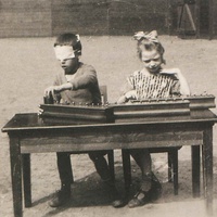 Older children working simultaneously with several sets of cylin-ders, kindergarten attached to a school at the Fröbelseminar in Hamburg, around 1920. The table was modified to child-scale by sawing off the legs - T. Müller, R. Schneider, <em>Lehrmaterialien 1913-1935. Möbel und Architektur. Techning Meterials 1913-1935. Furniture and Architecture</em>, München, Prestel Verlag, 2002, p.90$$$448
