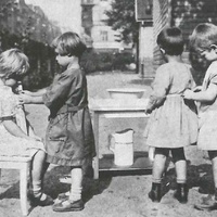 Children helping each other with getting dressed and fastening shoes. Children's House, Leopold-platz, Berlin-Wedding 1928 - T. Müller, R. Schneider, <em>Lehrmaterialien 1913-1935. Möbel und Architektur. Techning Meterials 1913-1935. Furniture and Architecture</em>, München, Prestel Verlag, 2002, p.78$$$408