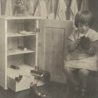 Child cleaning her shoes in a Berlin Children's House. Postcard published by the DMG (German Montessori Society), around 1927 with the inscription: "I don't want to be waited on any more, because I am not helpless." - T. Müller, R. Schneider, <em>Lehrmaterialien 1913-1935. Möbel und Architektur. Techning Meterials 1913-1935. Furniture and Architecture</em>, München, Prestel Verlag, 2002, p.79$$$410