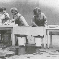 Housework in a Berlin Children's House. The DMG (German Montessori Society) commissioned the furniture (cf. design sketches on p. 61). Photograph taken in 1927 - T. Müller, R. Schneider, <em>Lehrmaterialien 1913-1935. Möbel und Architektur. Techning Meterials 1913-1935. Furniture and Architecture</em>, München, Prestel Verlag, 2002, p.83$$$430